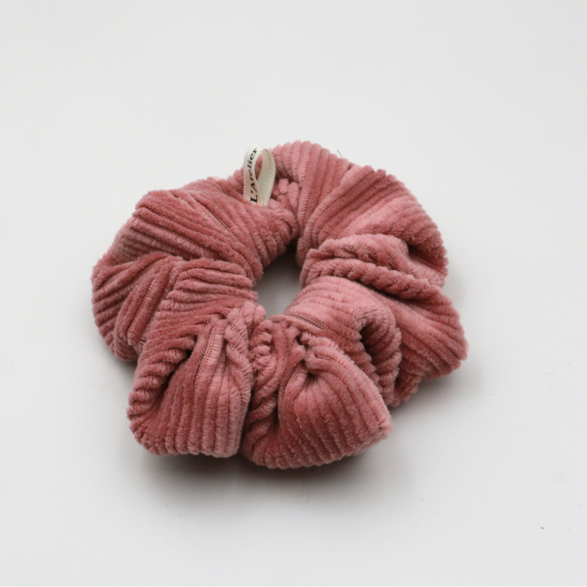 Corduroy Pink scrunchie on a white background