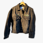 Black denim jacket with floral embroidery on a white background